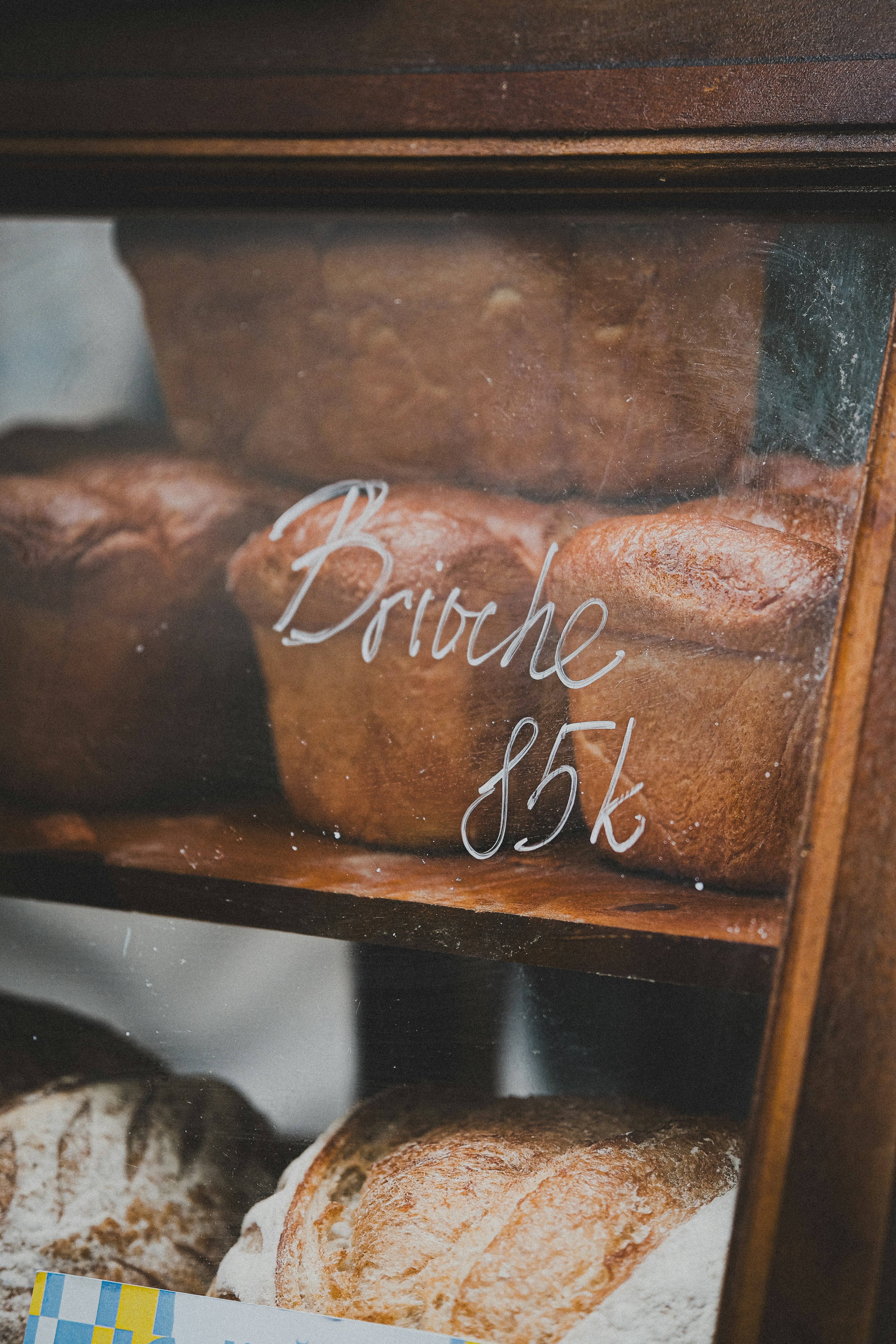a display case filled with lots of baked goods