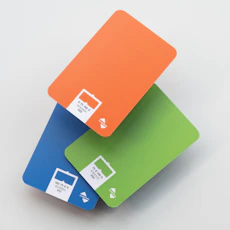 three credit cards stacked on top of each other