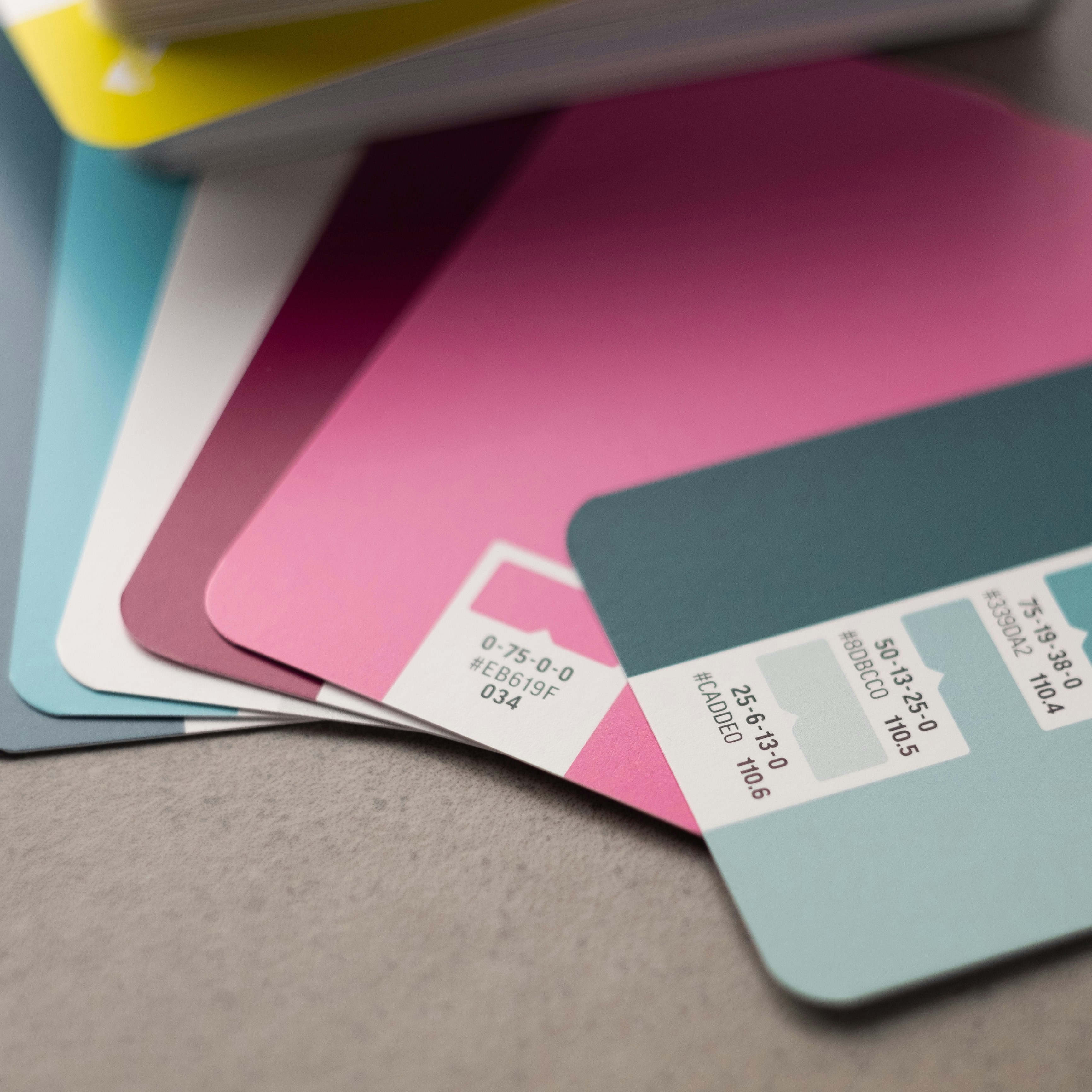 a stack of credit cards sitting on top of a table