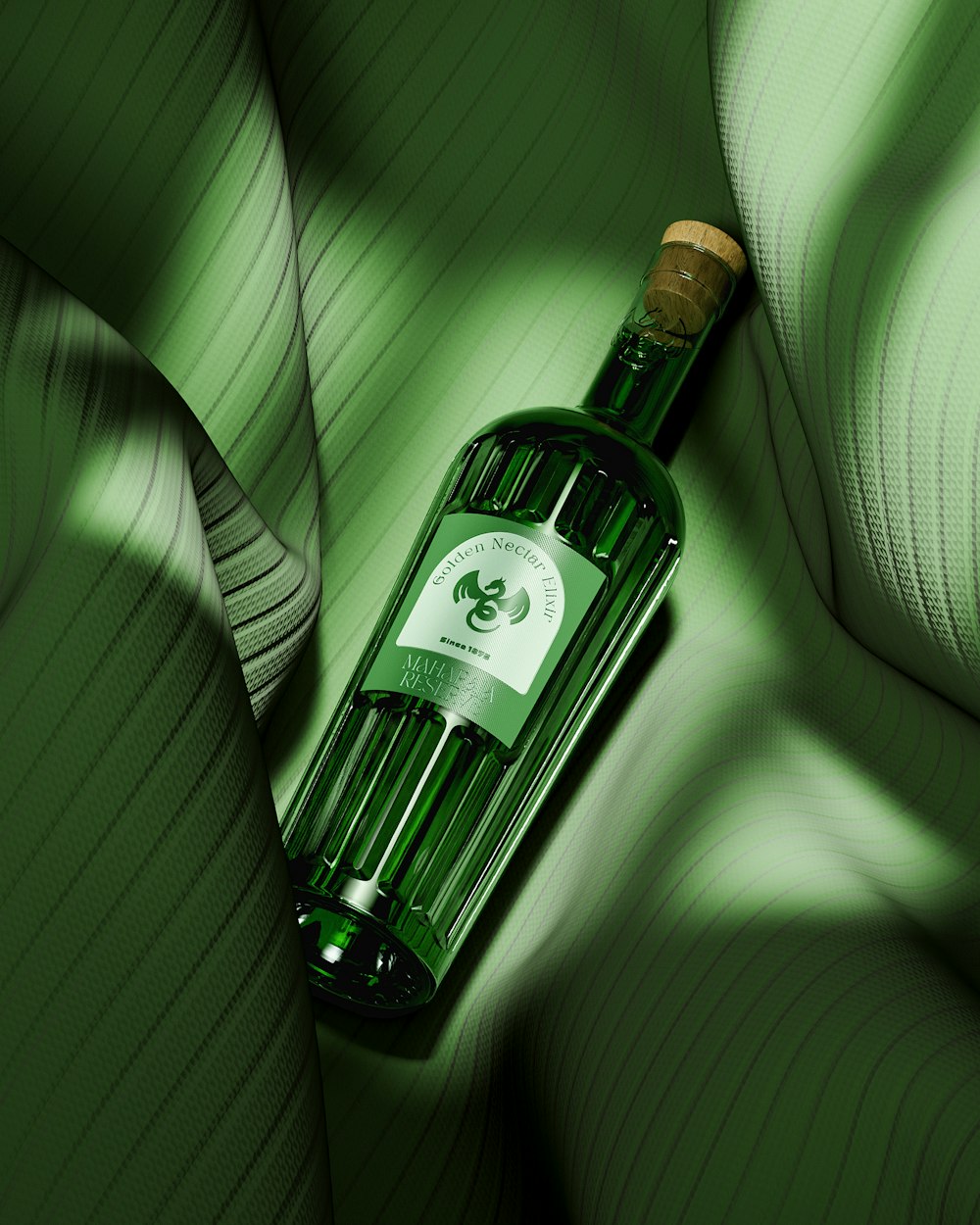a bottle of wine sitting on top of a green couch