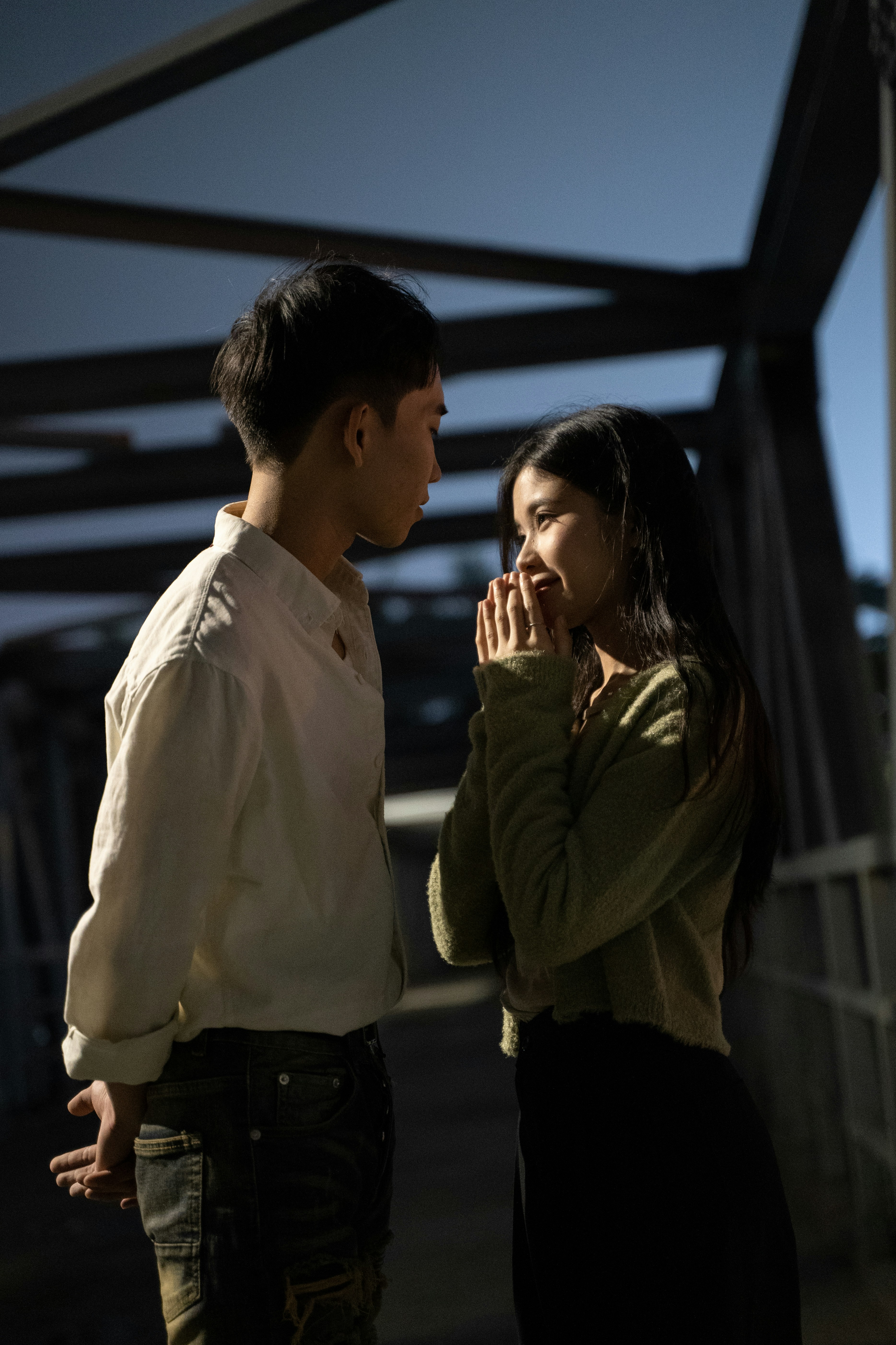 a man and a woman standing next to each other