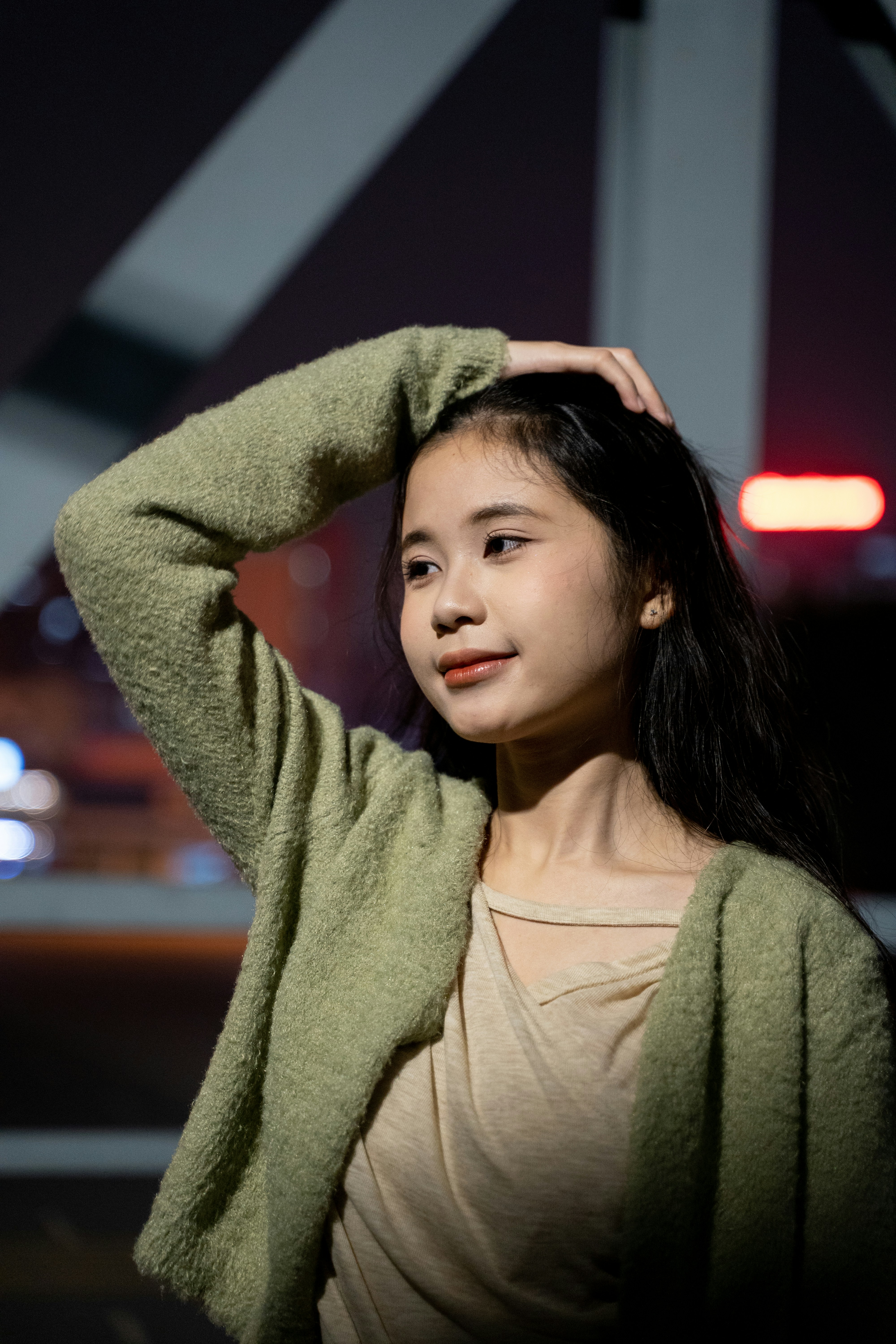 a young woman is posing for a picture