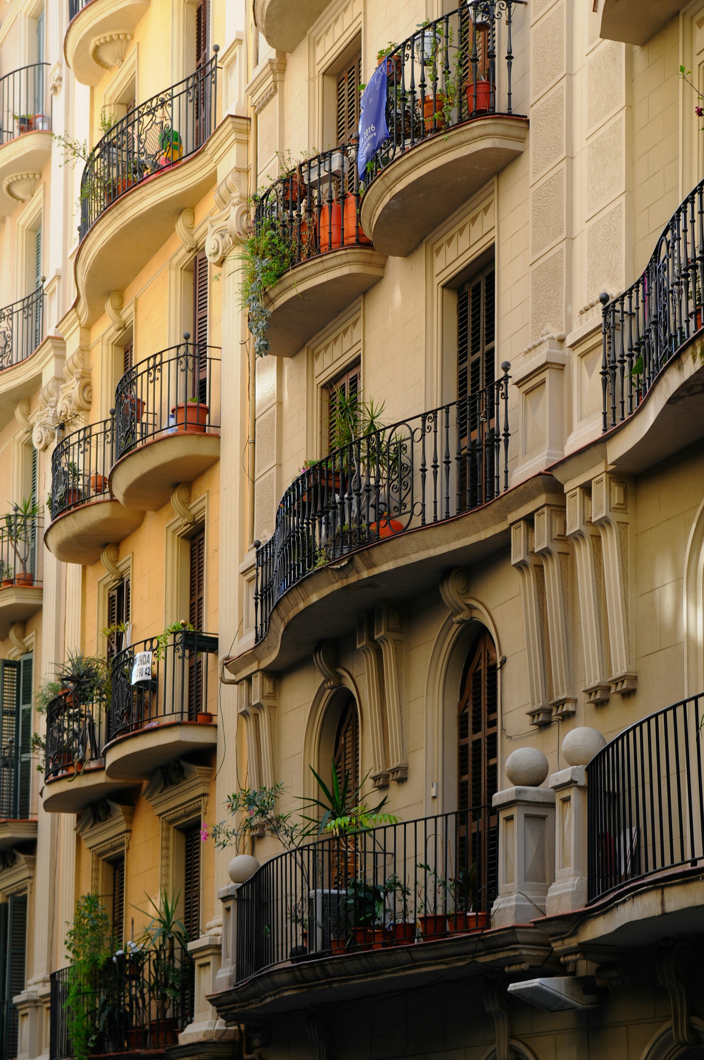 a row of buildings with balconies and balconies