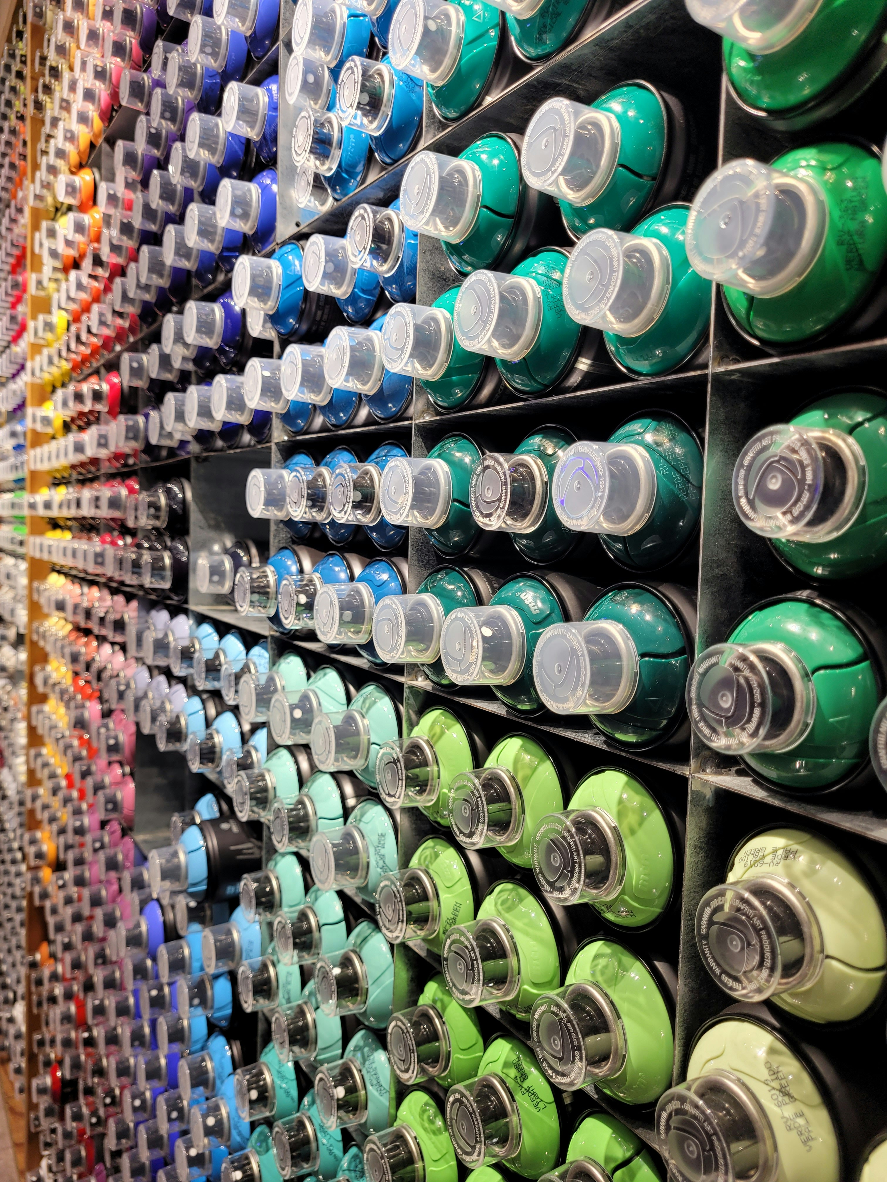 Montana spray paint can shelf, NYC, USA