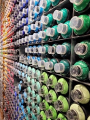 a display of different colors of toothpaste in a store