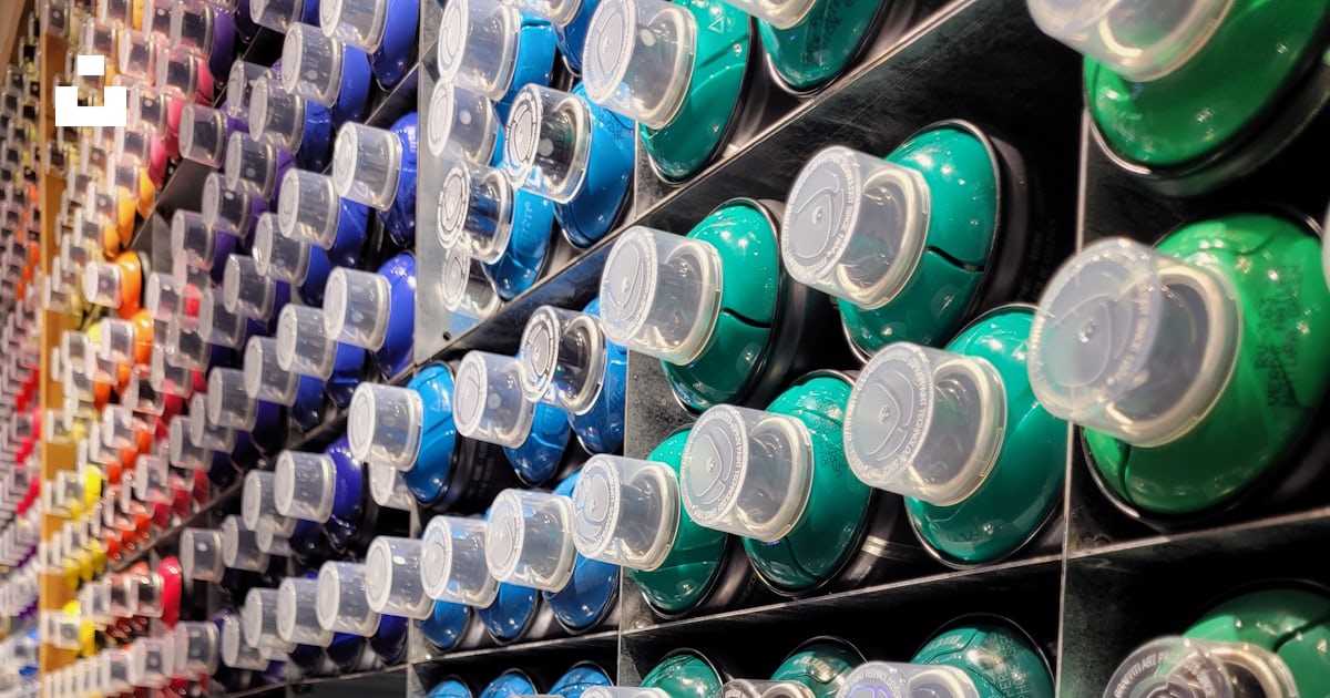 A display of different colors of toothpaste in a store photo – Free New ...