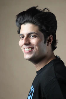 a man with a smile on his face