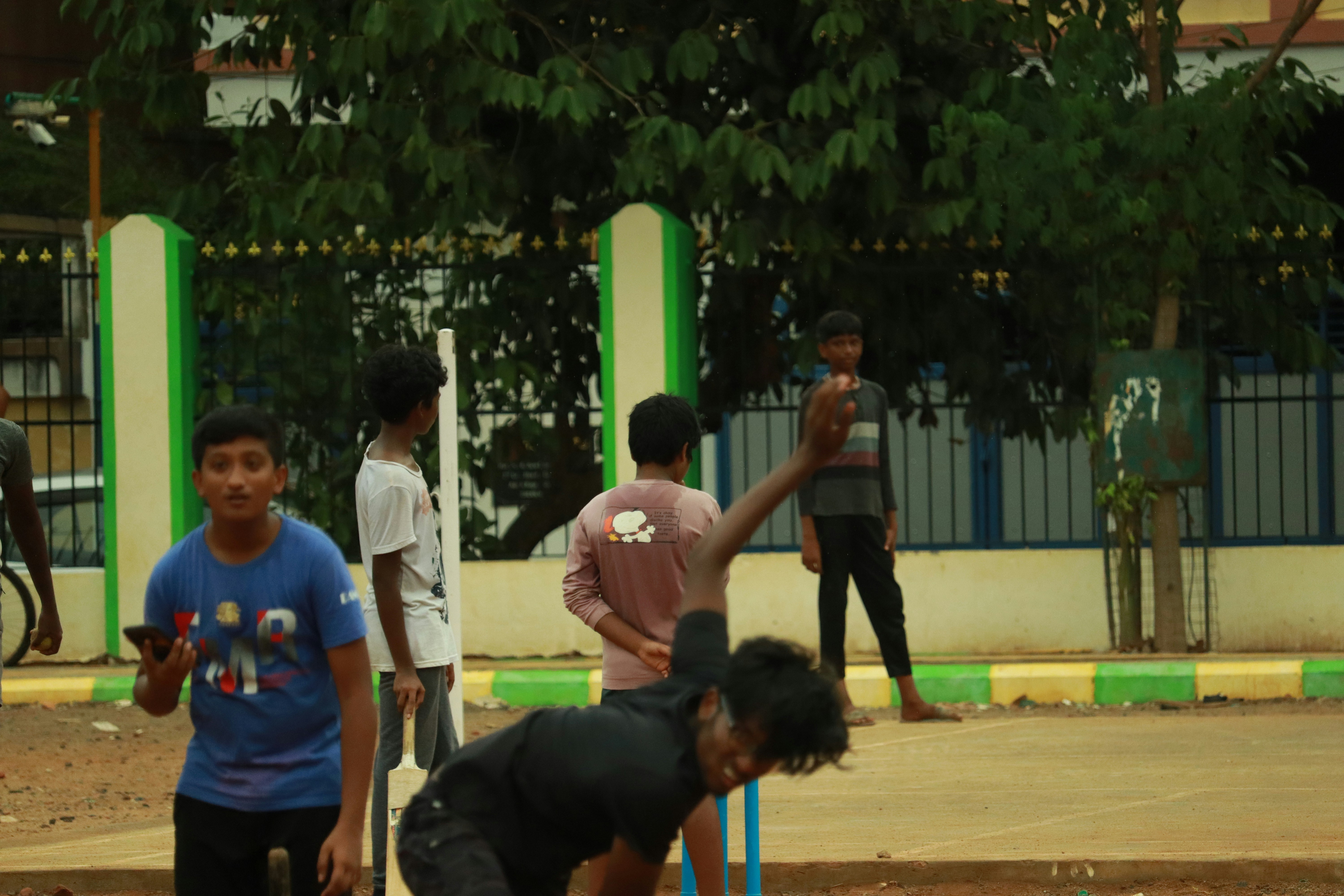 Young cricket players training