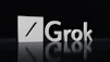 a black and white photo of the word grok