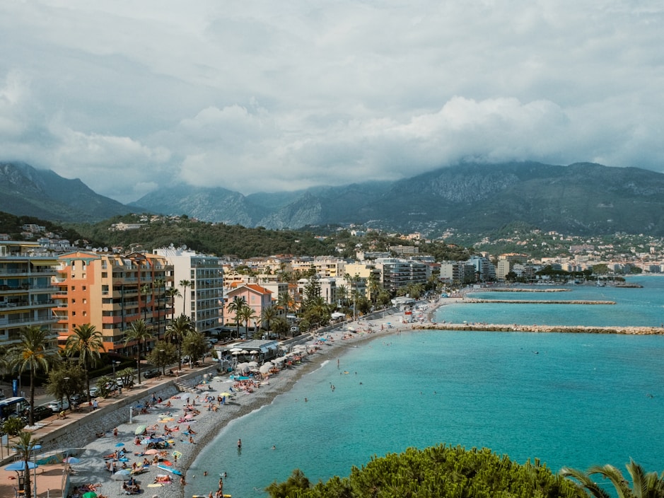 a beach with a bunch of cars parked on it