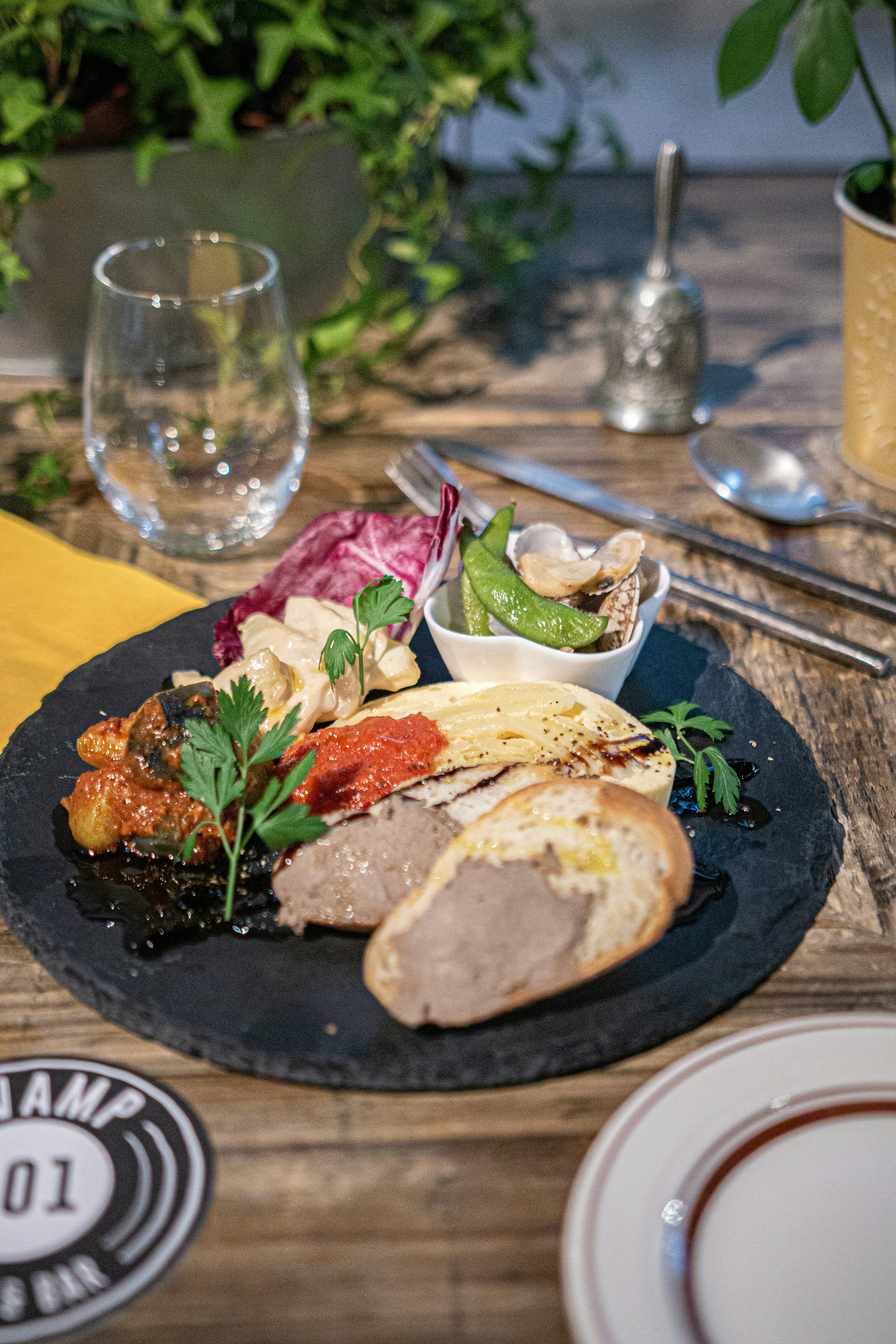 a plate of food on a wooden table