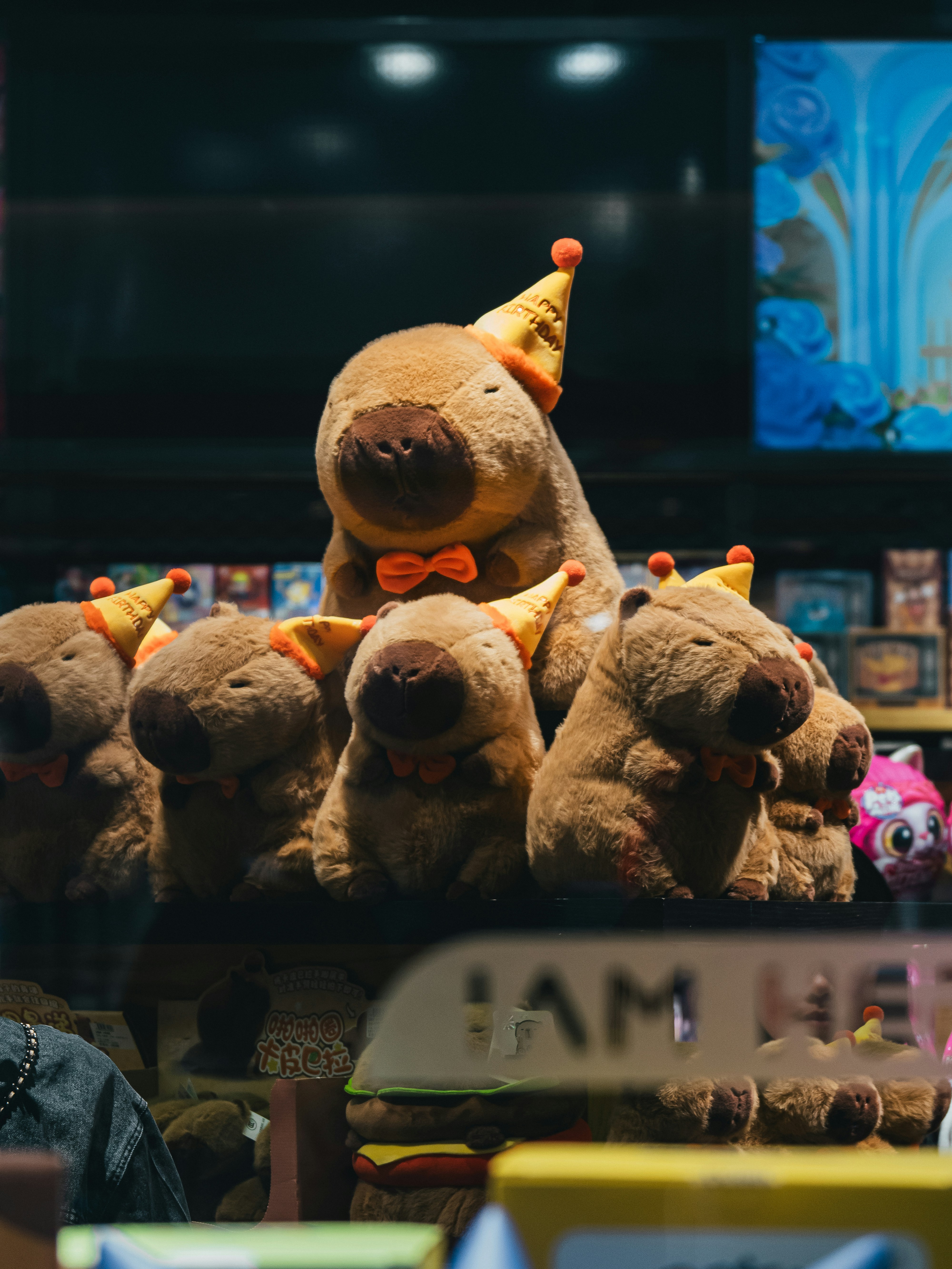 a group of stuffed animals sitting on top of a table