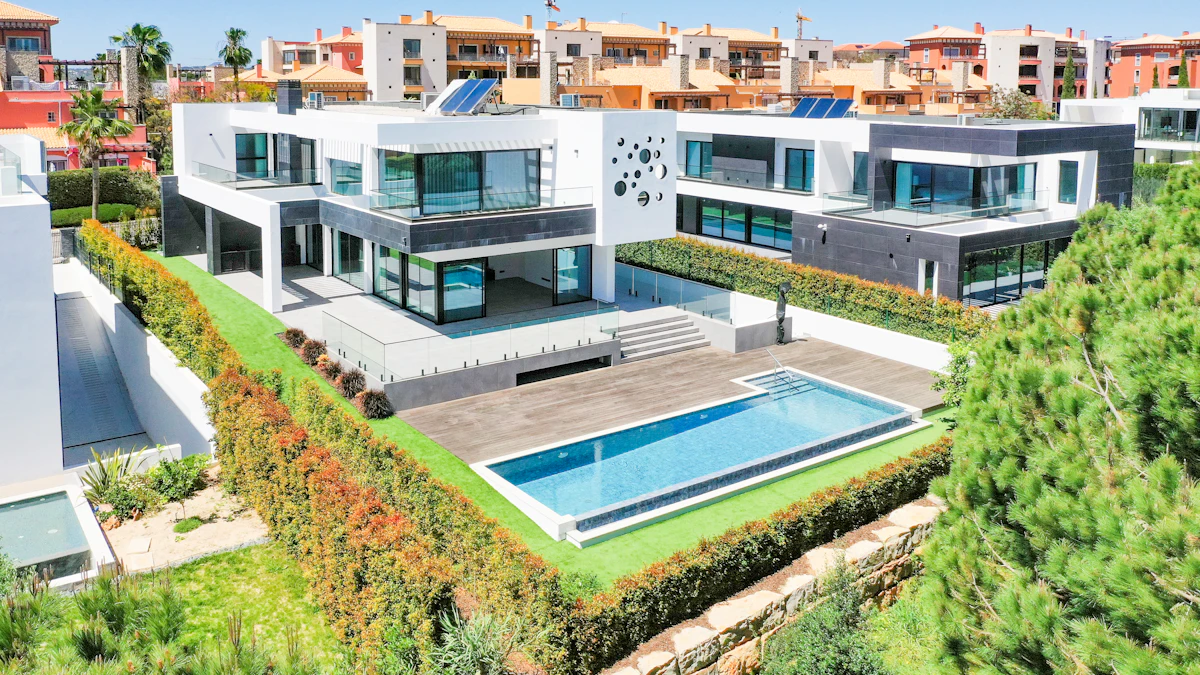 Contemporary white villa with a private swimming pool and landscaped garden in Vilamoura, Algarve, Portugal