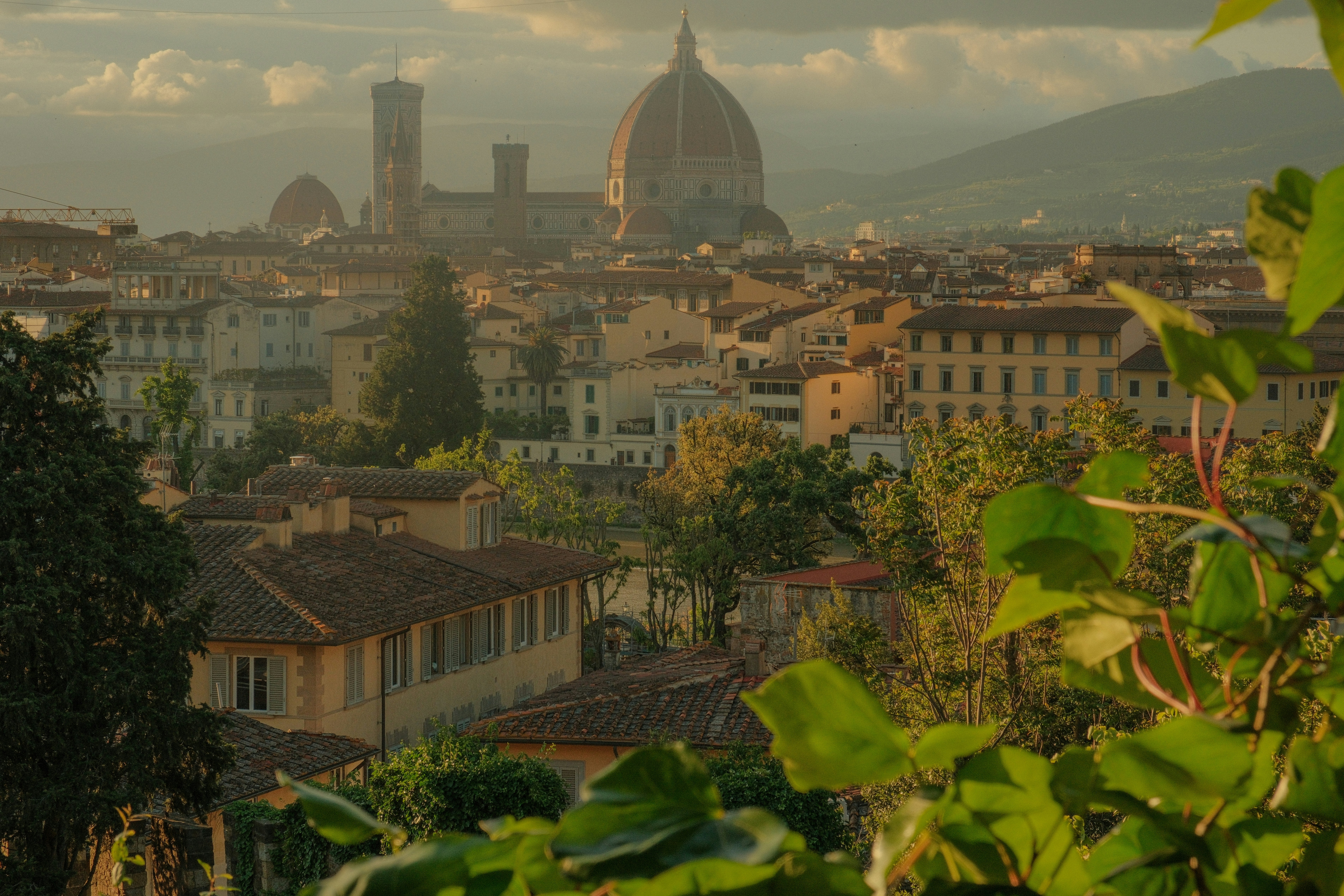 a view of a city with a dome in the background