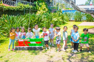 a group of children standing next to each other