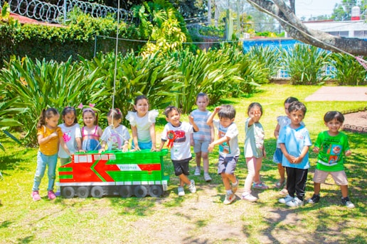 a group of children standing next to each other