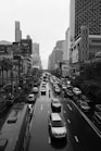 a black and white photo of a city street
