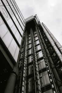 a black and white photo of a tall building