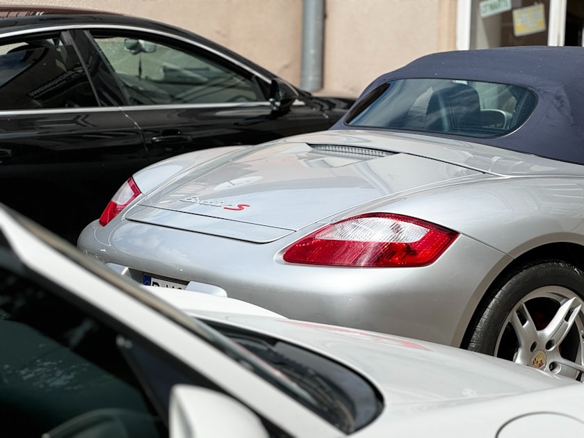 a couple of cars parked next to each other