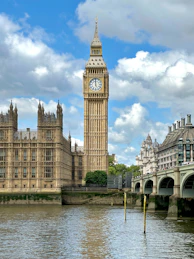 a large clock tower towering over a city