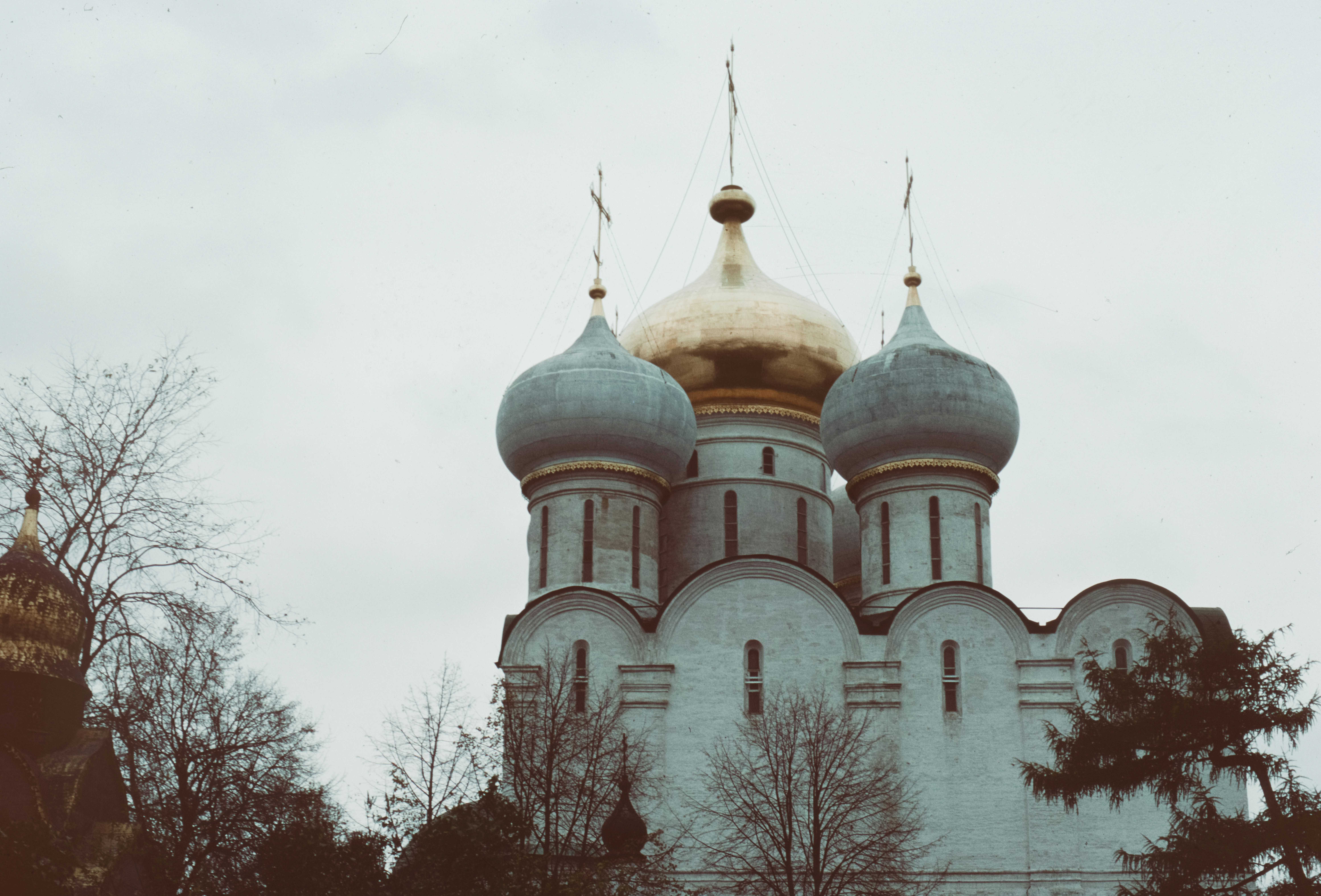 a large white building with a gold dome