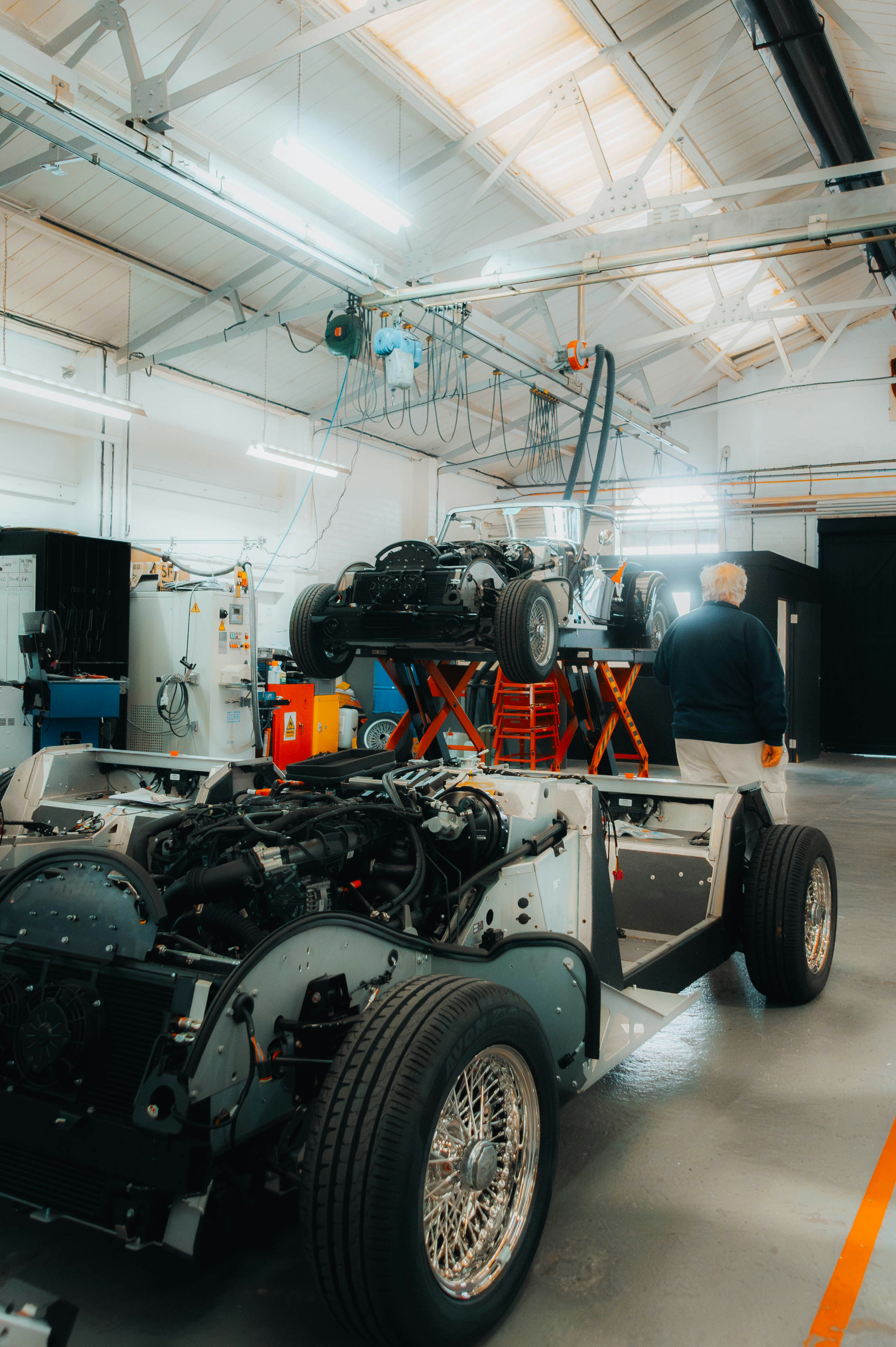a car being worked on in a garage
