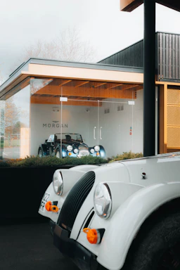 a white truck parked in front of a building