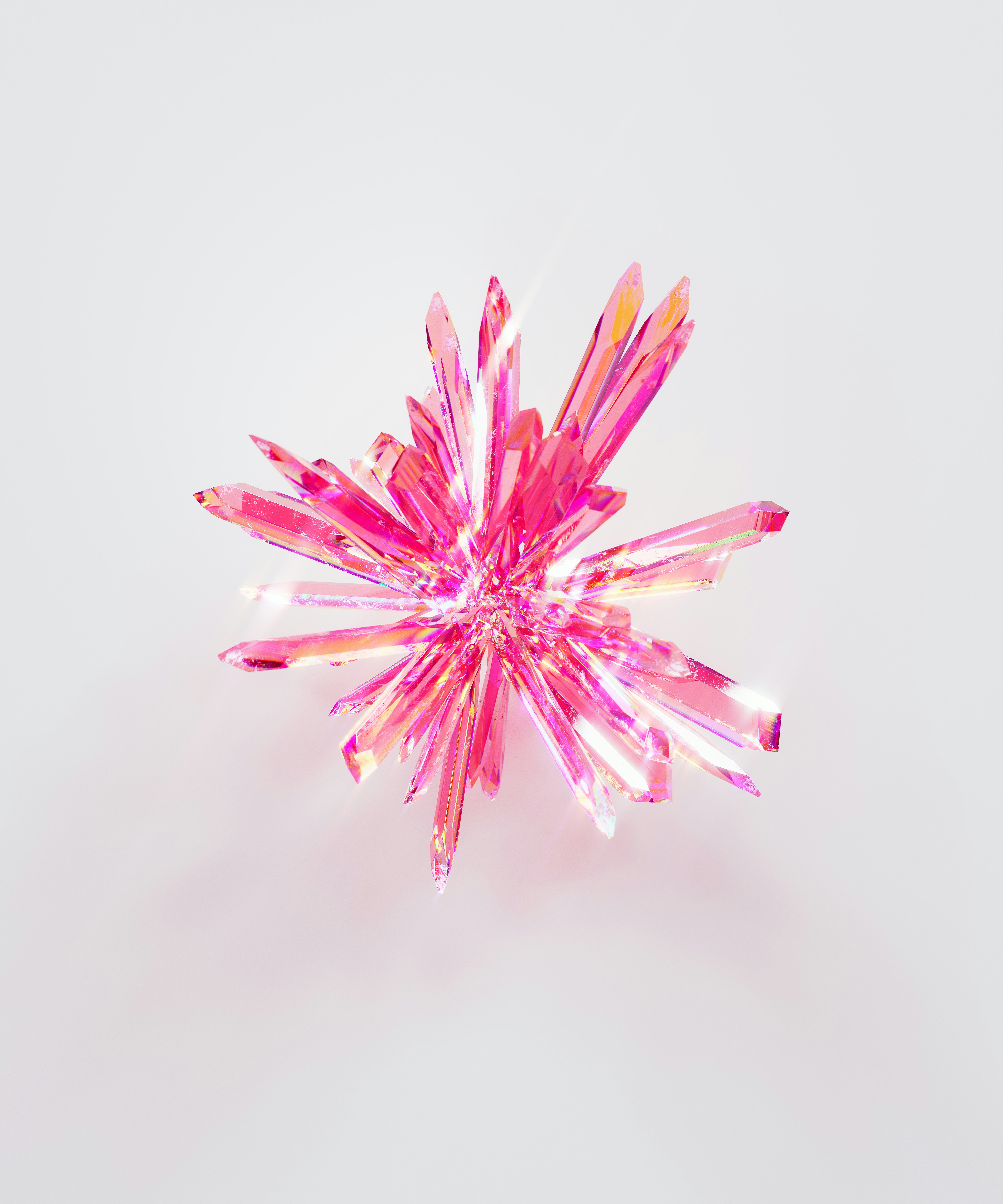 a close up of a pink object on a white surface