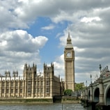 a large clock tower towering over a city