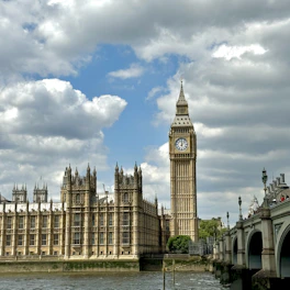 a large clock tower towering over a city
