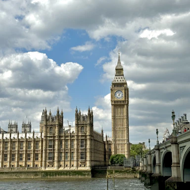 a large clock tower towering over a city