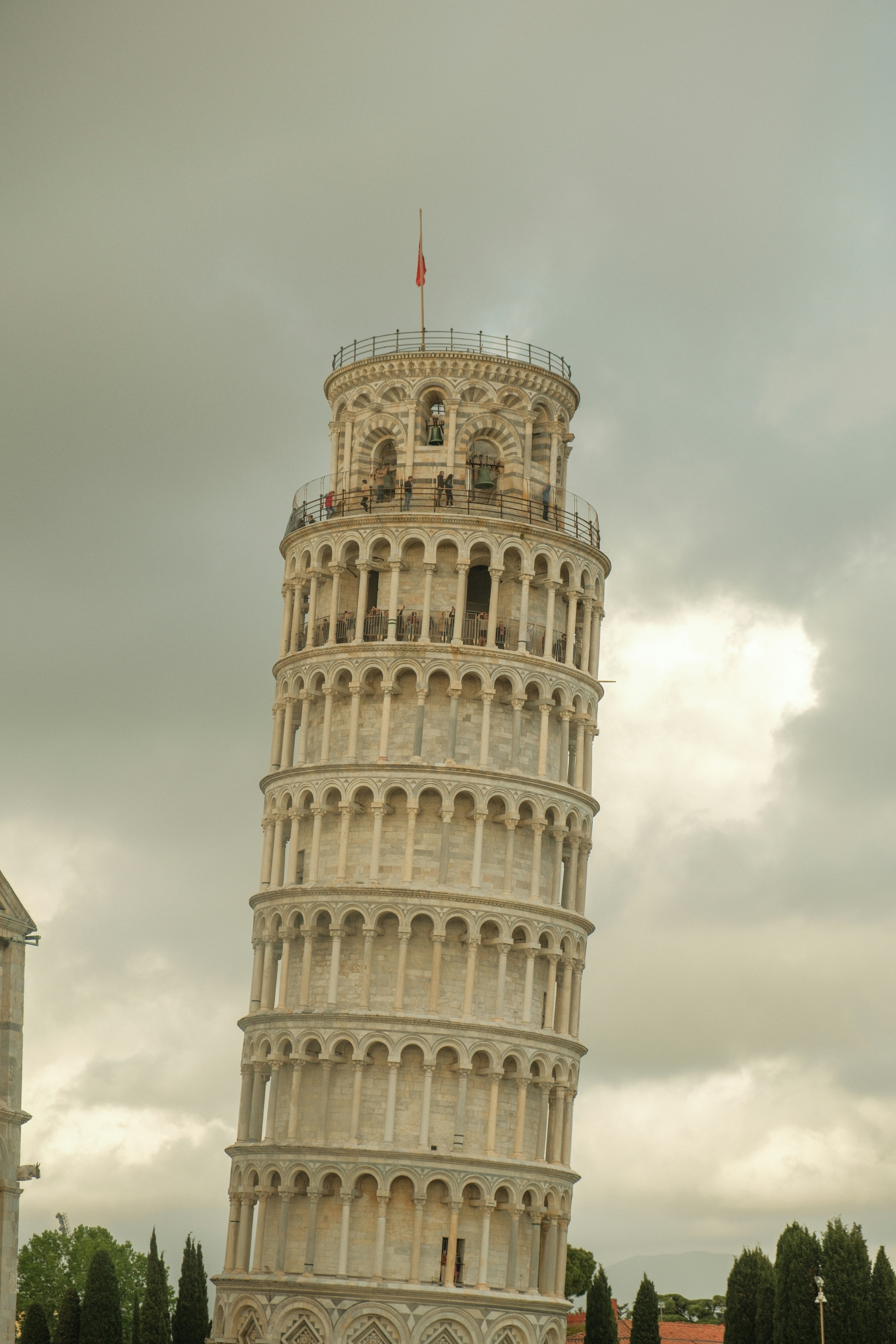 a very tall tower with a clock on it's side