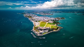 an aerial view of an island in the middle of the ocean