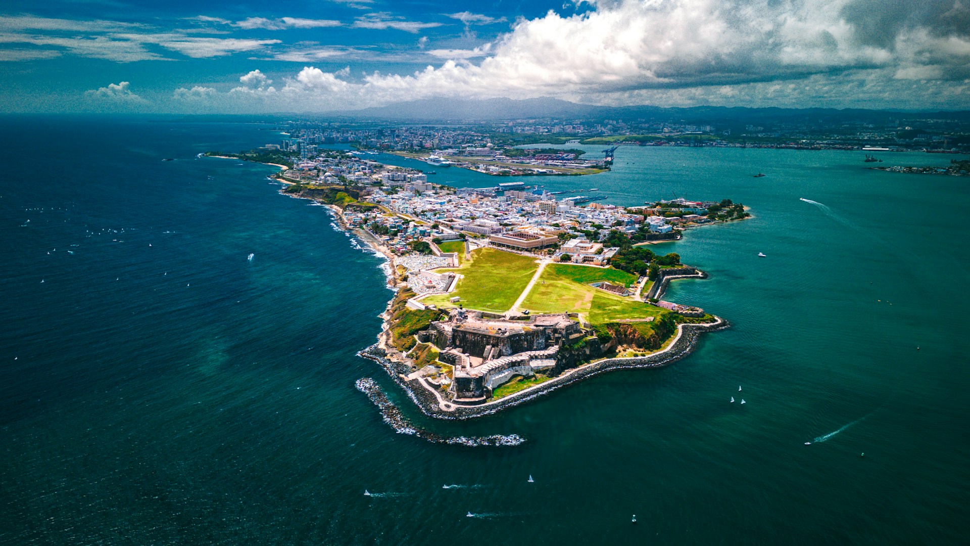 an aerial view of an island in the middle of the ocean