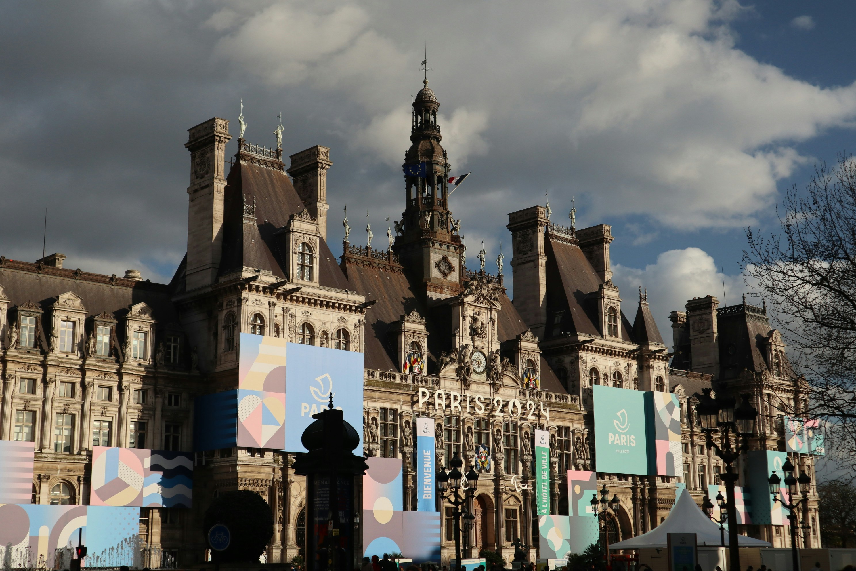 A large building with a clock tower on top of it photo – Free Building ...