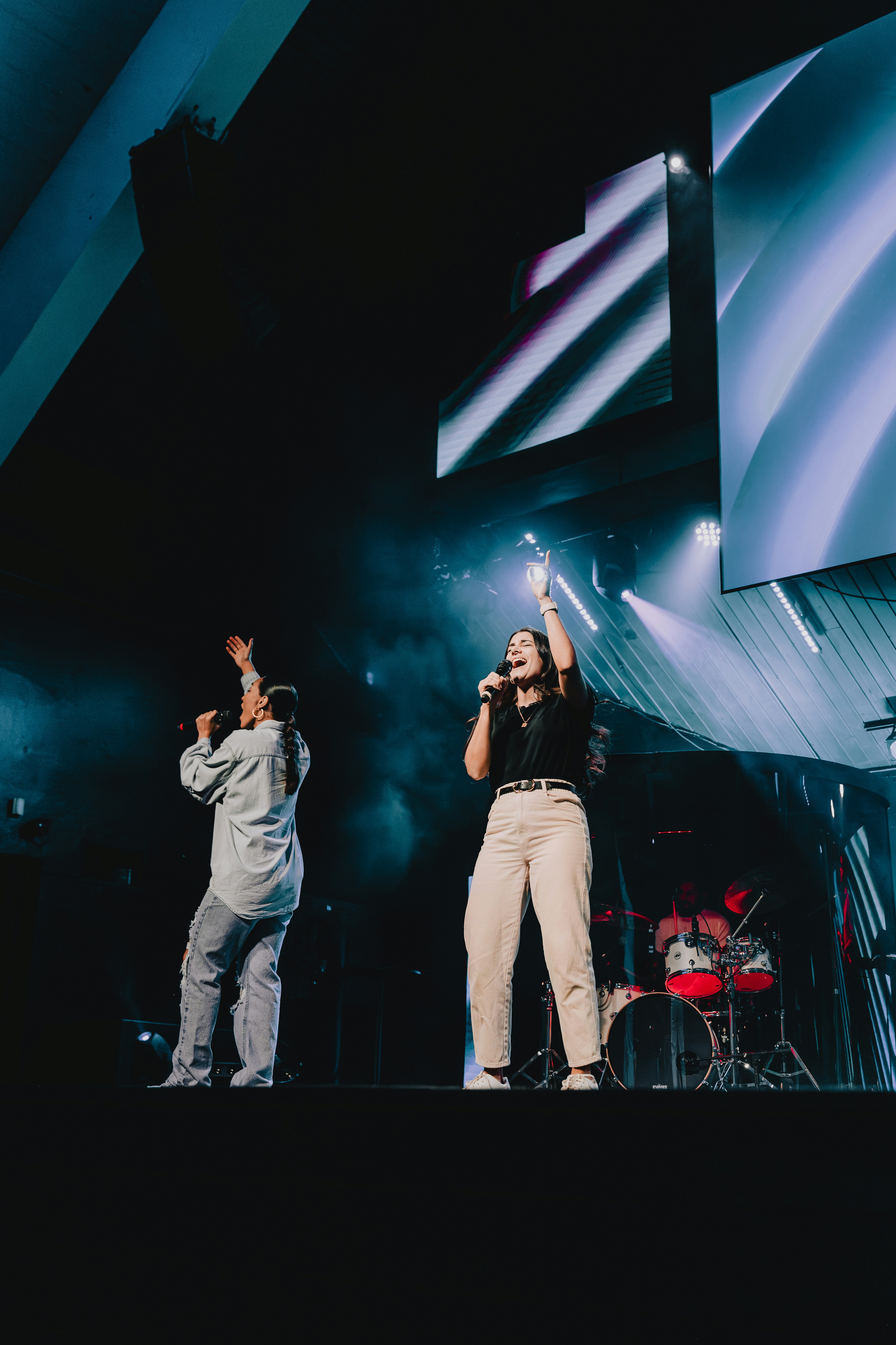 a couple of people that are on a stage