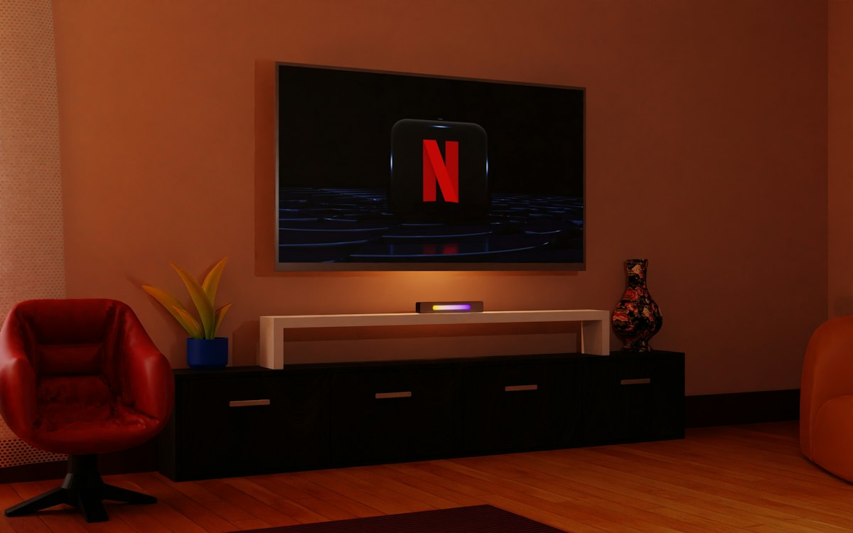 A flat screen TV mounted on a wall in a modern living room