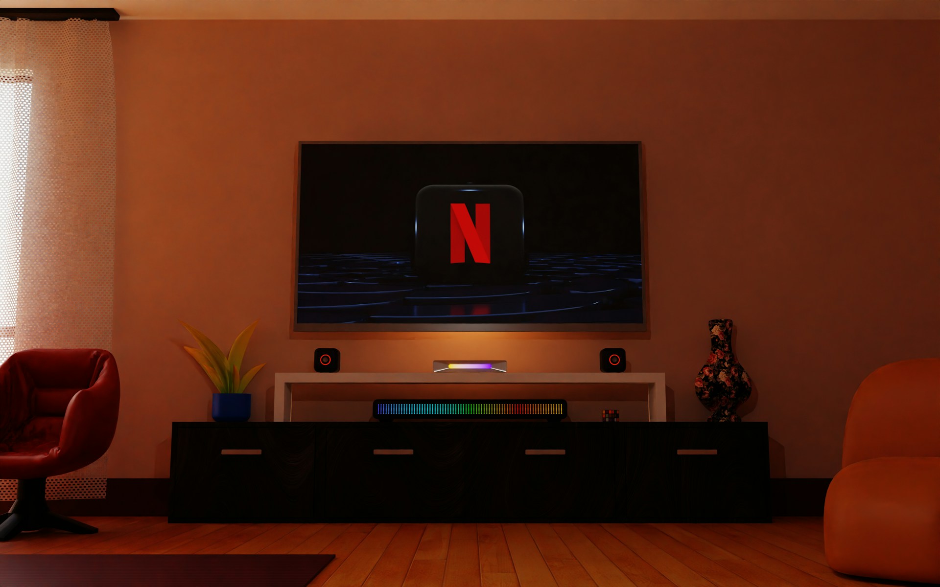 a flat screen tv sitting on top of a tv stand