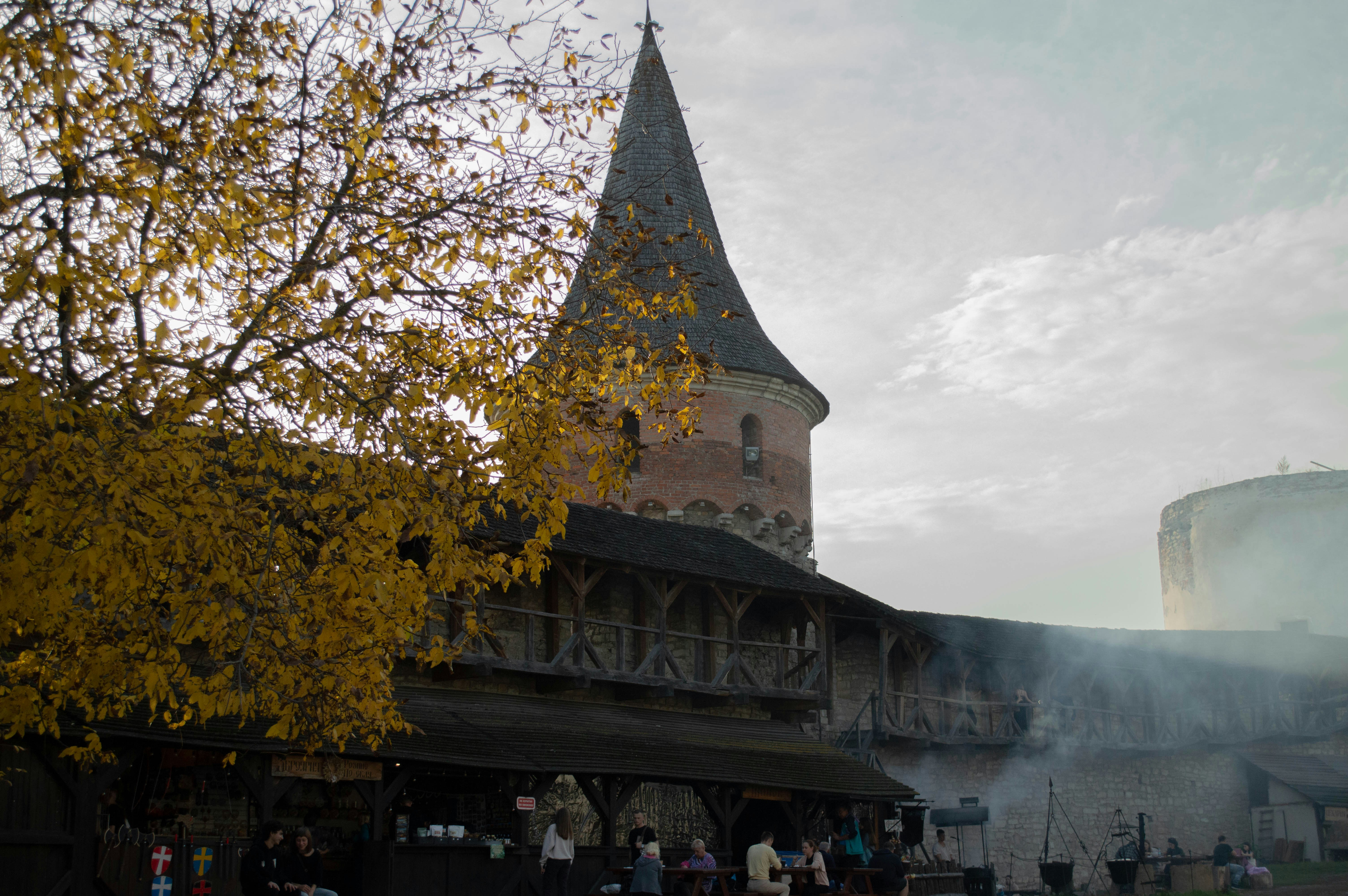 a group of people standing outside of a building