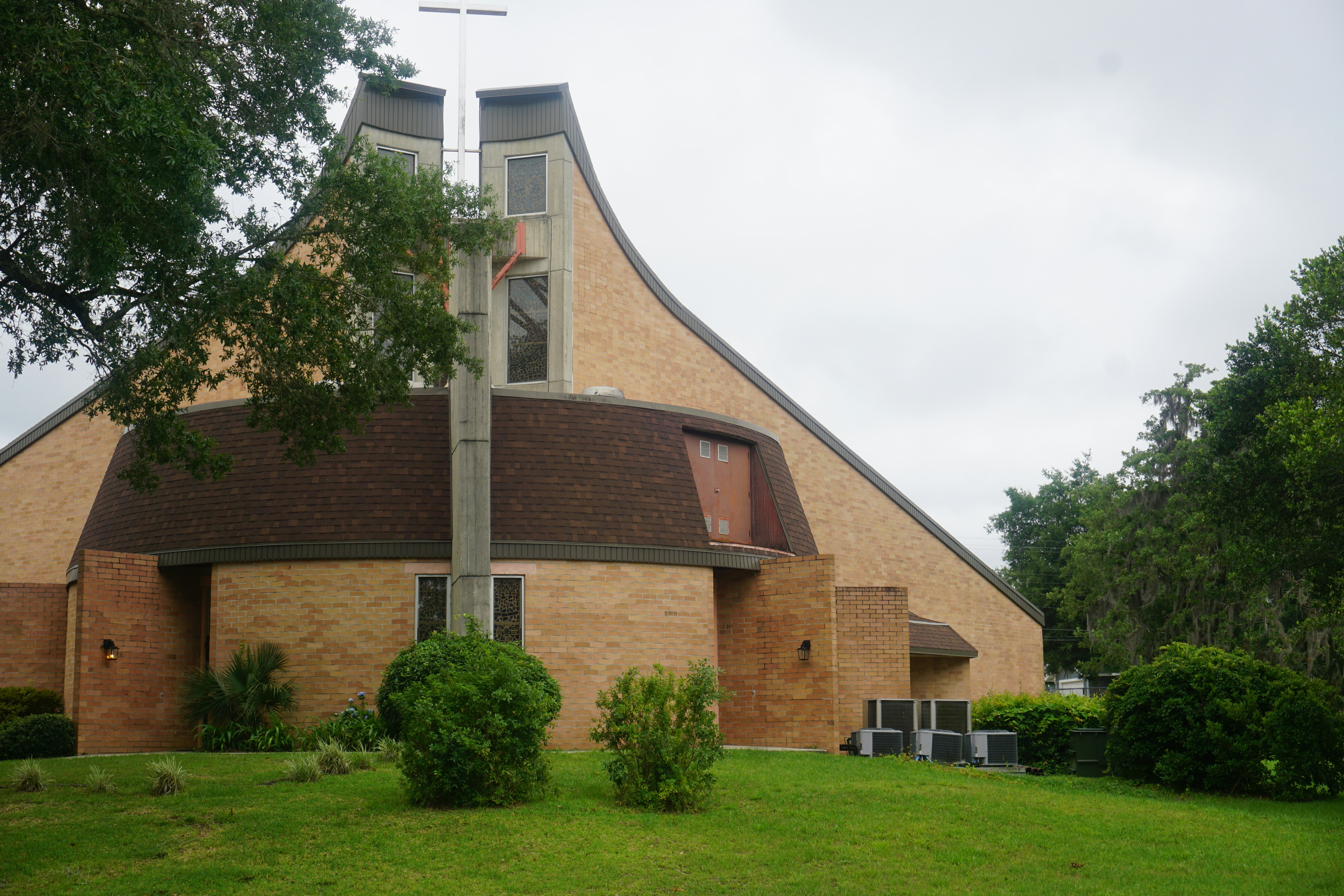 a church with a steeple and a clock tower