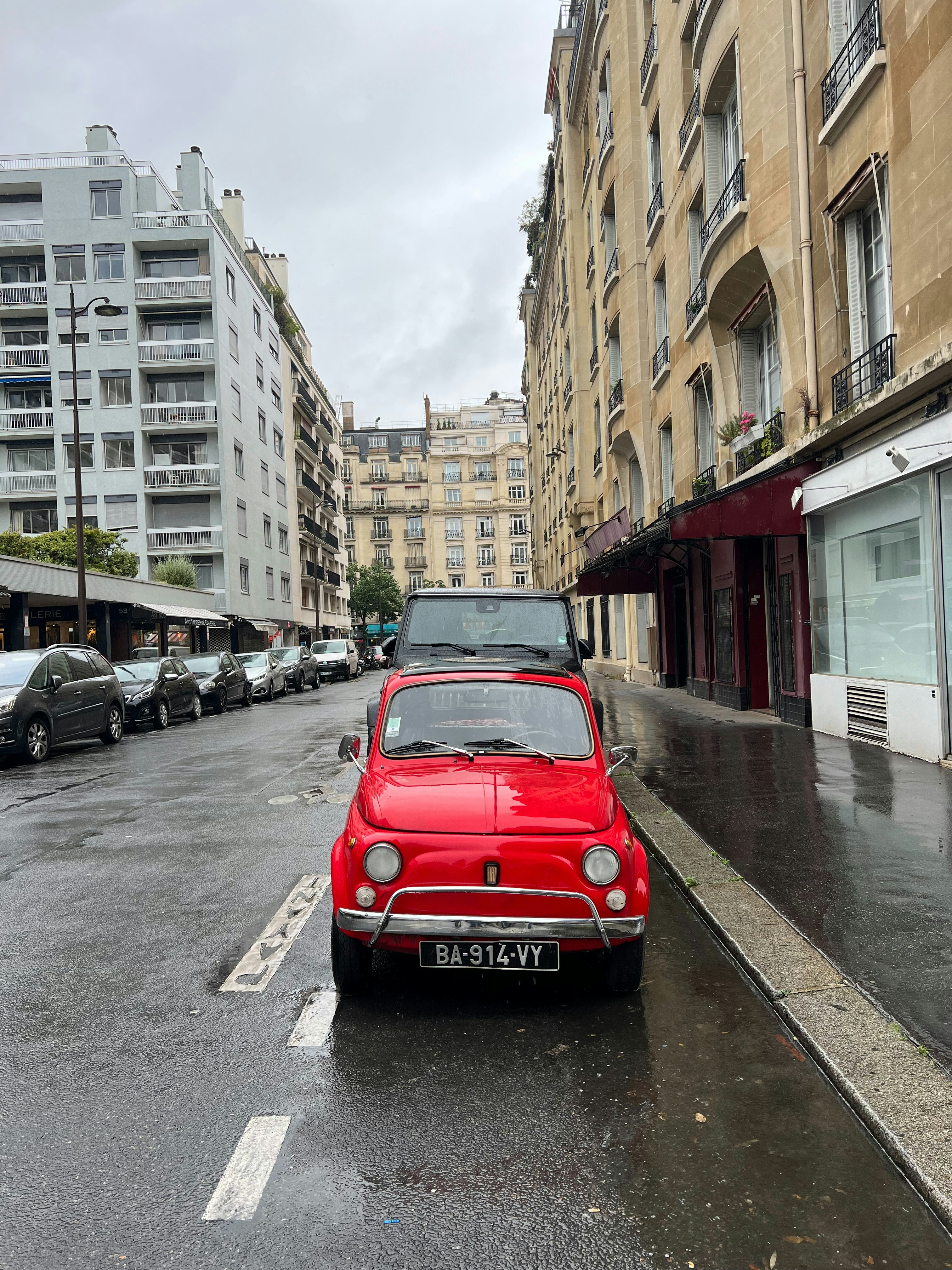 A red car parked on the side of the road photo – Free Car Image on Unsplash