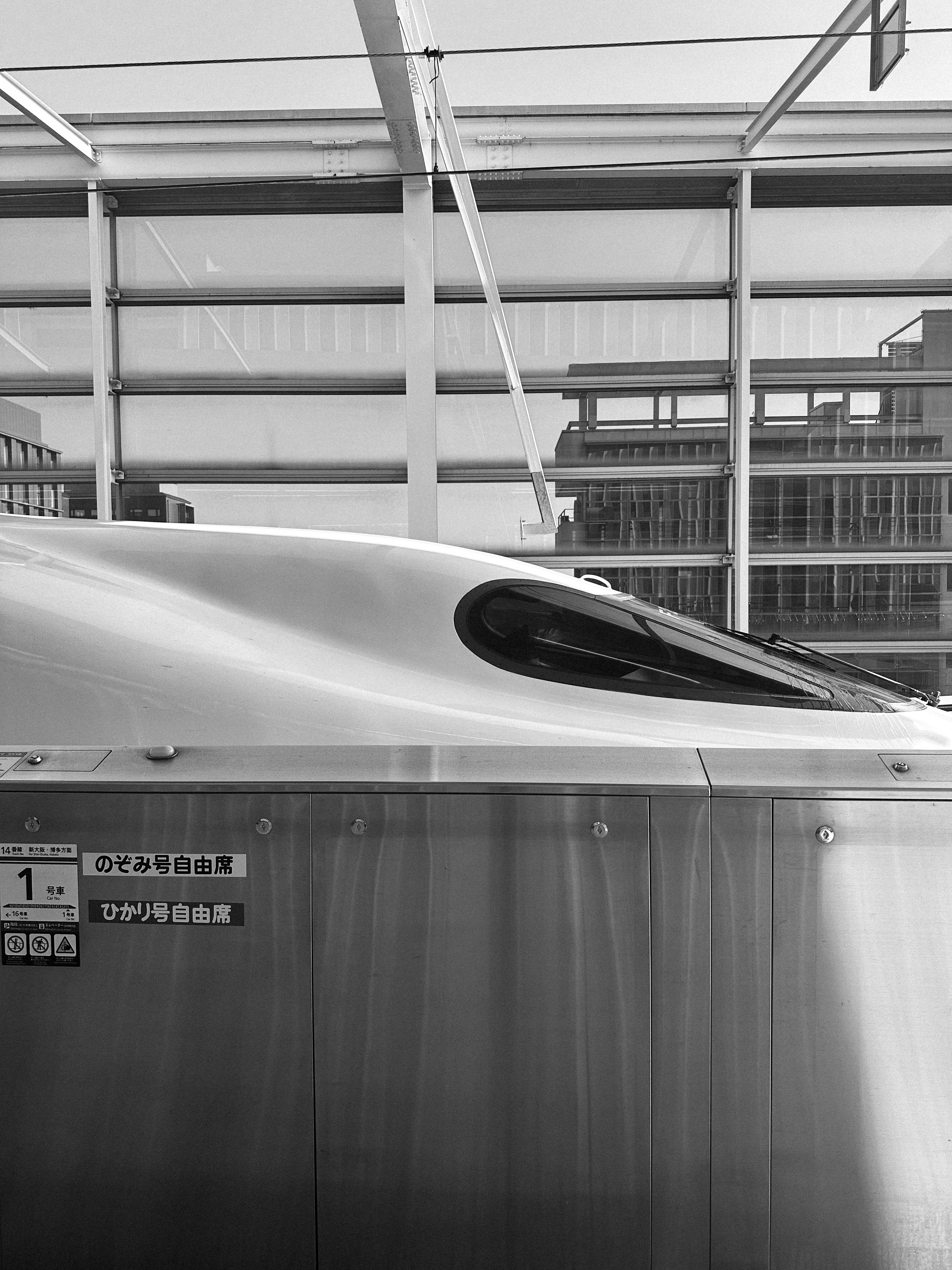 a modern train is parked in a station