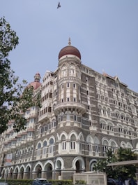 a very tall building with a dome on top of it