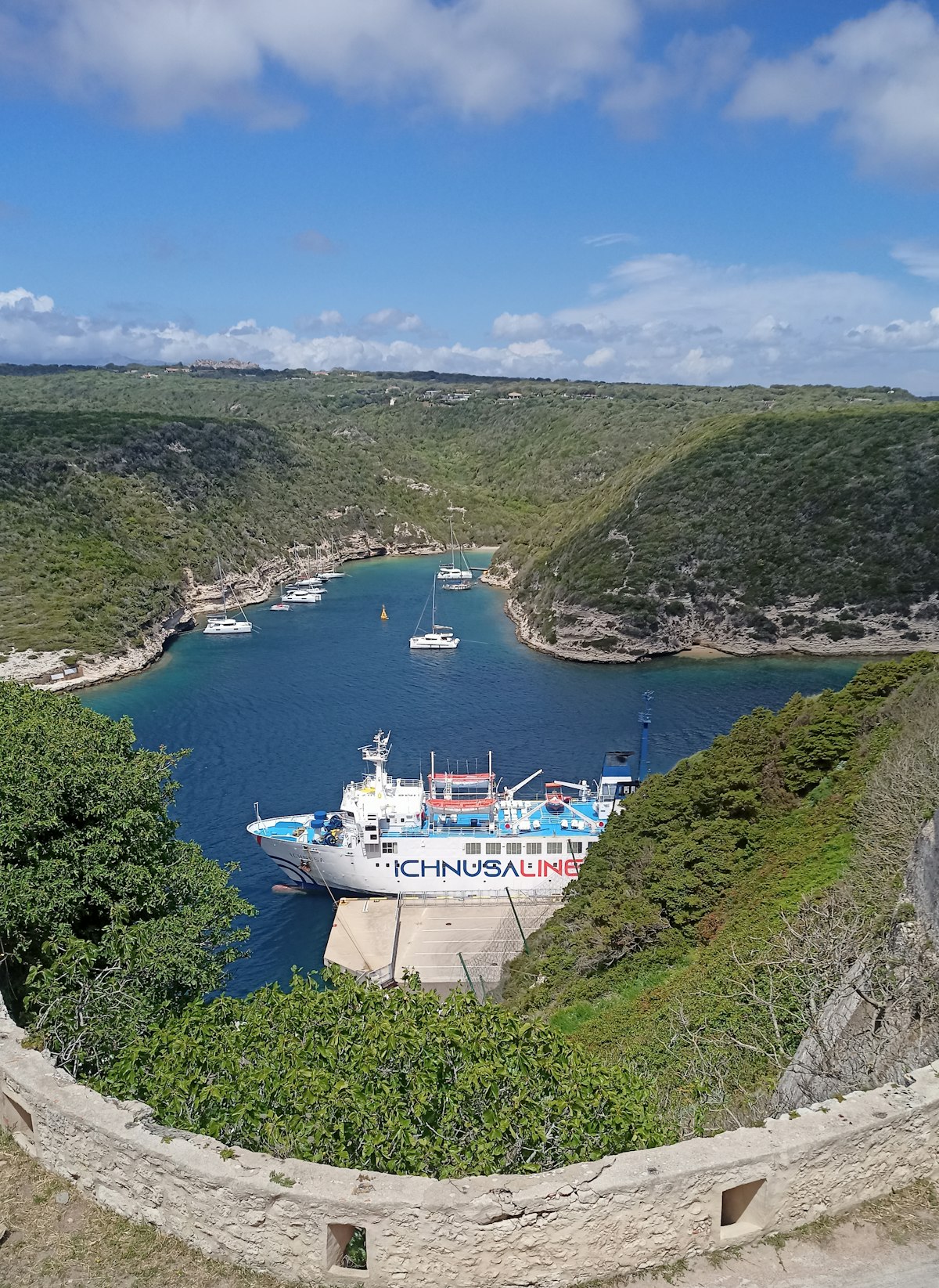 Corsica May — Bonifacio cliffs and citadel from sea