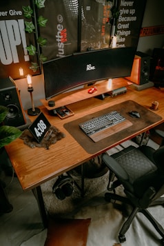 a computer desk with a keyboard and mouse