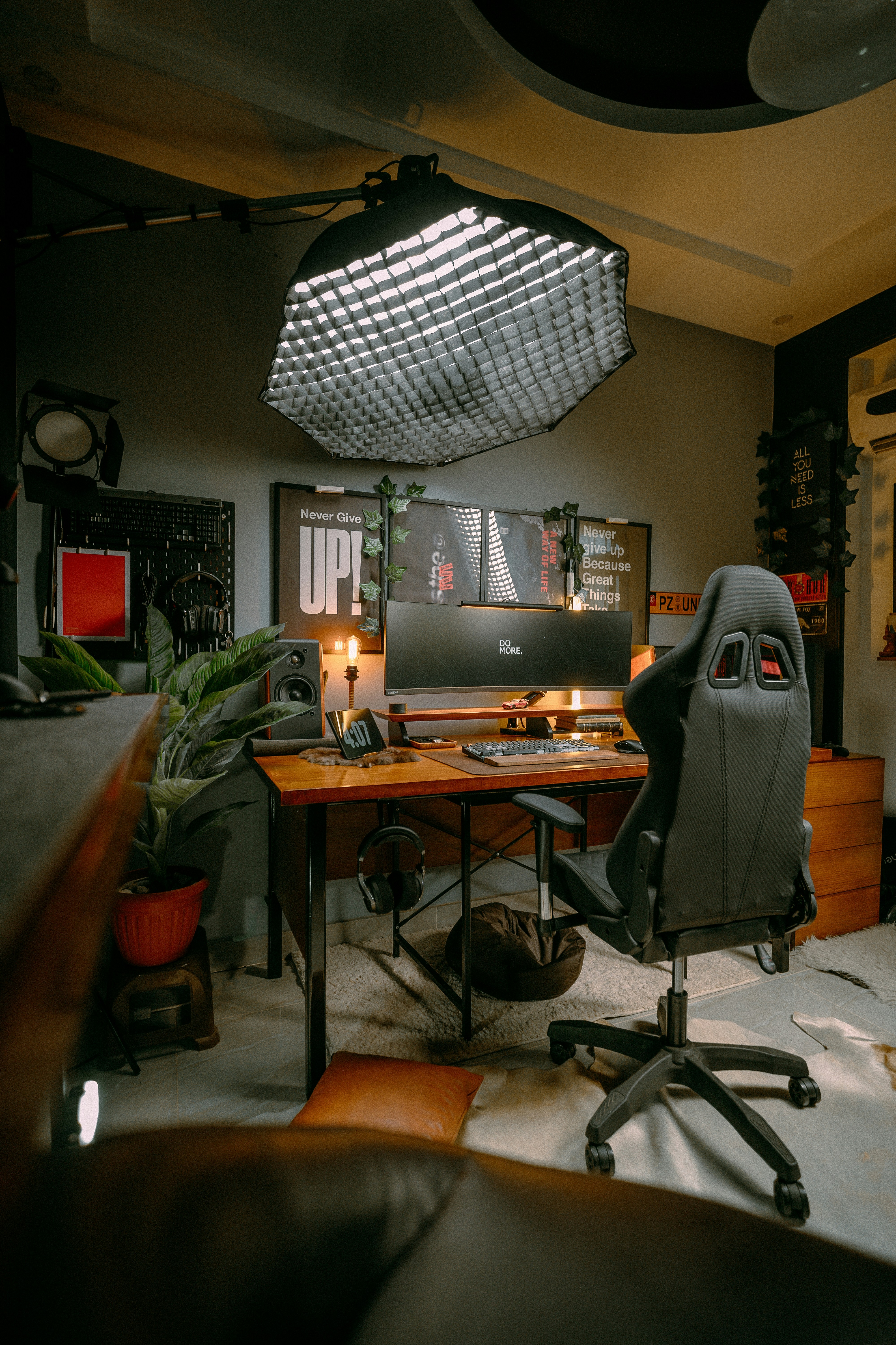 a computer desk with a chair and a computer monitor
