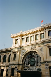 a large building with a clock on the front of it