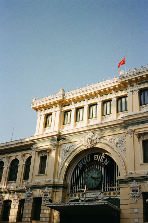 a large building with a clock on the front of it