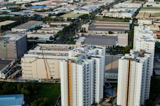 an aerial view of a city with tall buildings