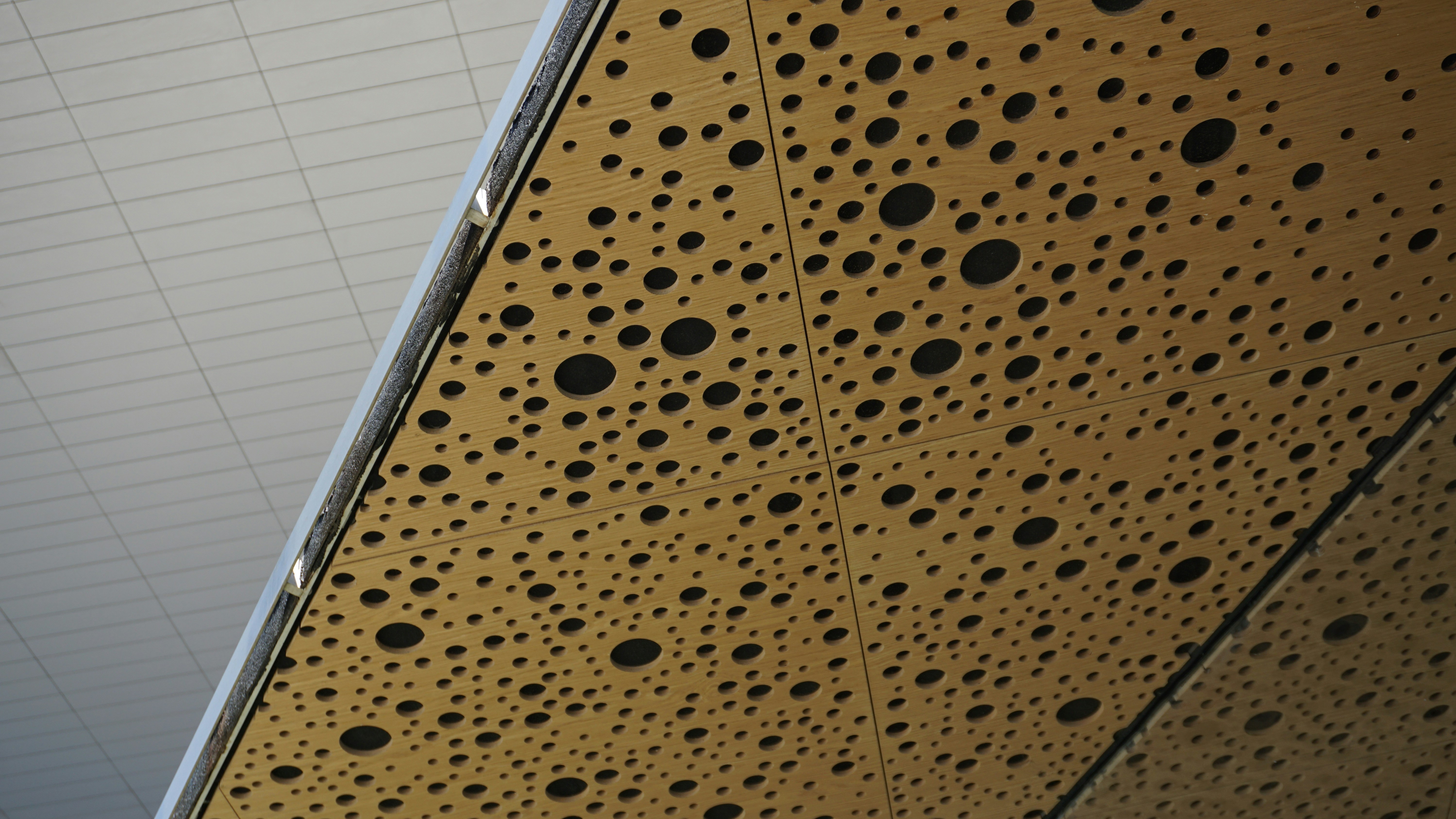 Comparing templated vs. non-templated holes on a wall - homemade install mirror template